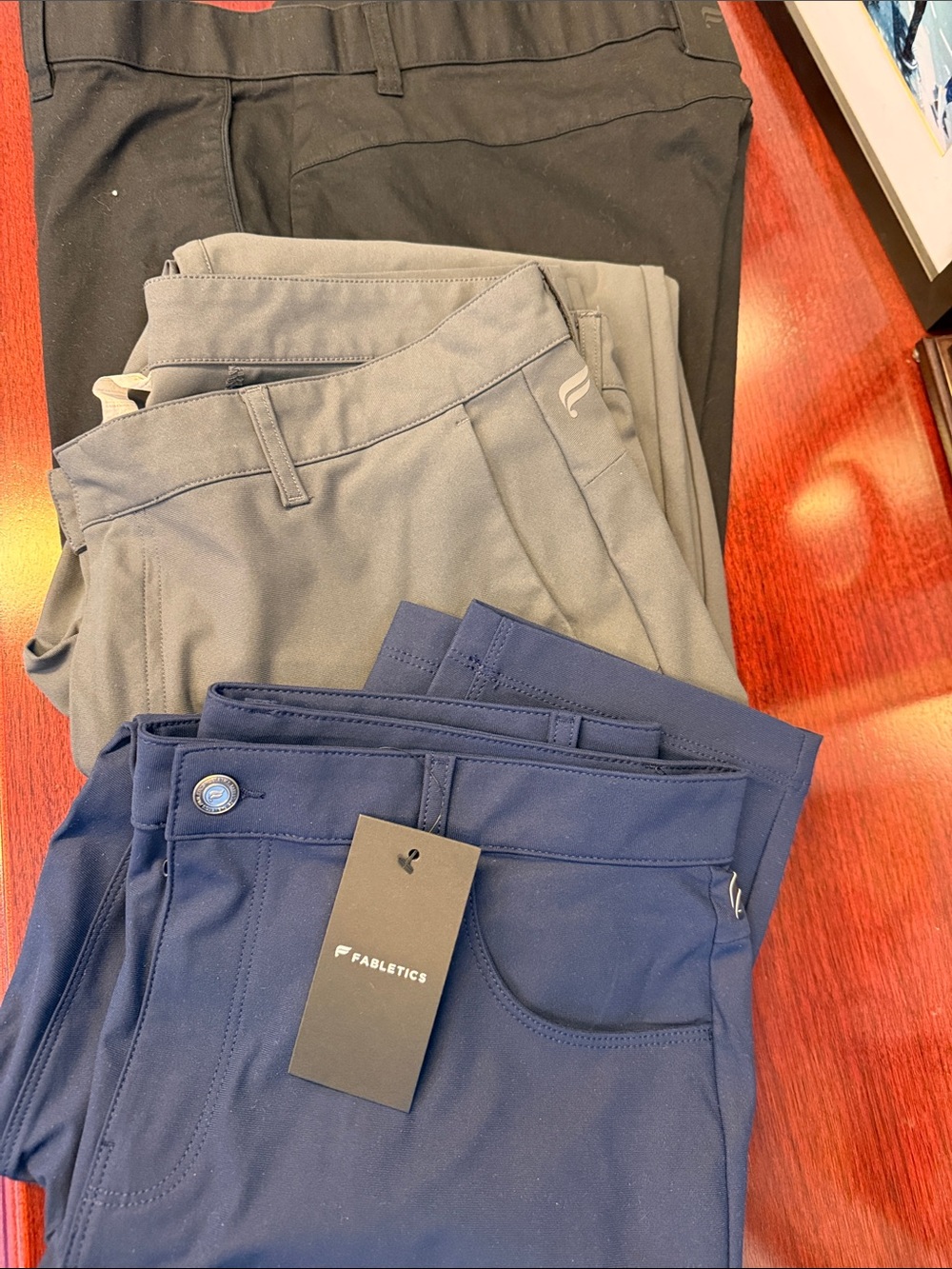 Fabletics Men’s Chino-Style Performance Pants in Navy, Gray & Black - 3-Pack